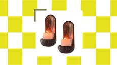 White and yellow checkerboard background with an image of two wooden candle wall sconces in the center