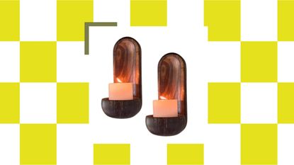 White and yellow checkerboard background with an image of two wooden candle wall sconces in the center