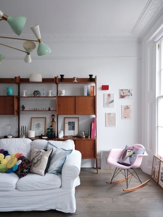 Living room with wooden shelving unit